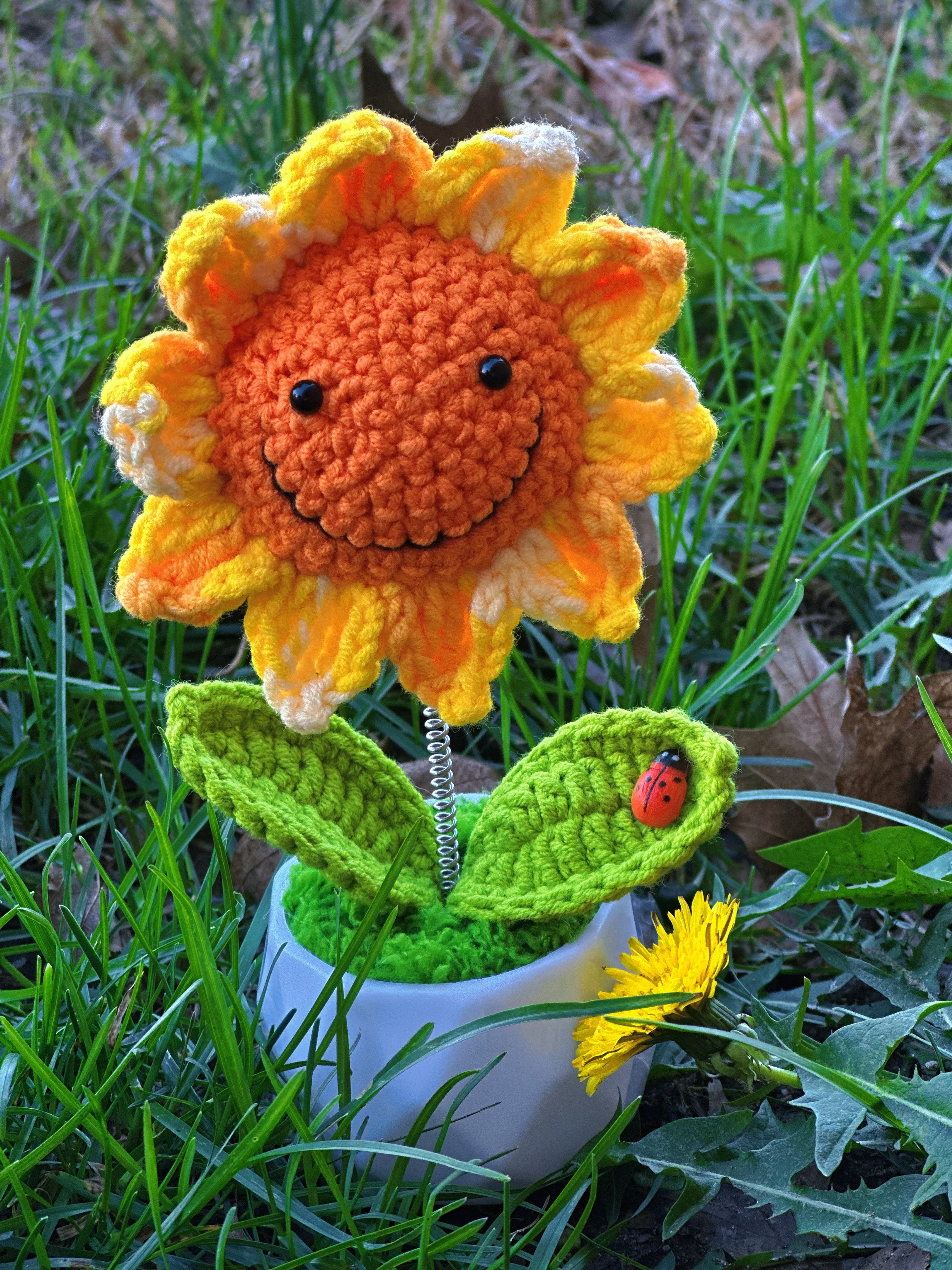 Smiling Crochet Sunflower Bobblehead with Ladybug