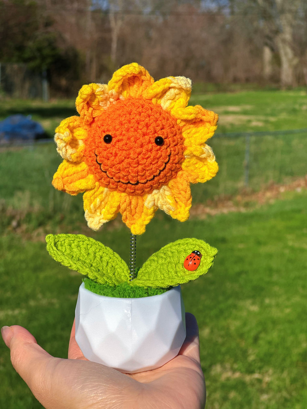 Smiling Crochet Sunflower Bobblehead with Ladybug